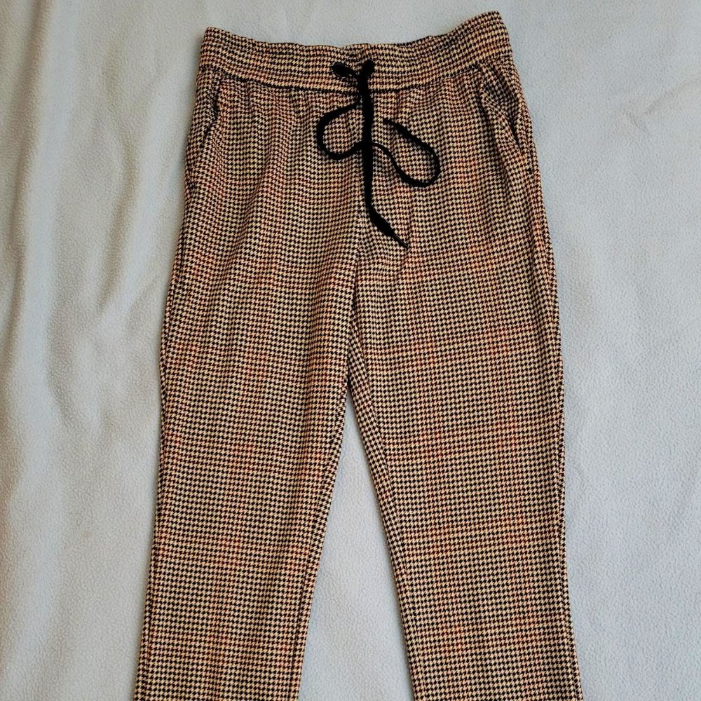 C by one tan and black hounds tooth pull on drawstring pants. Size S/P.